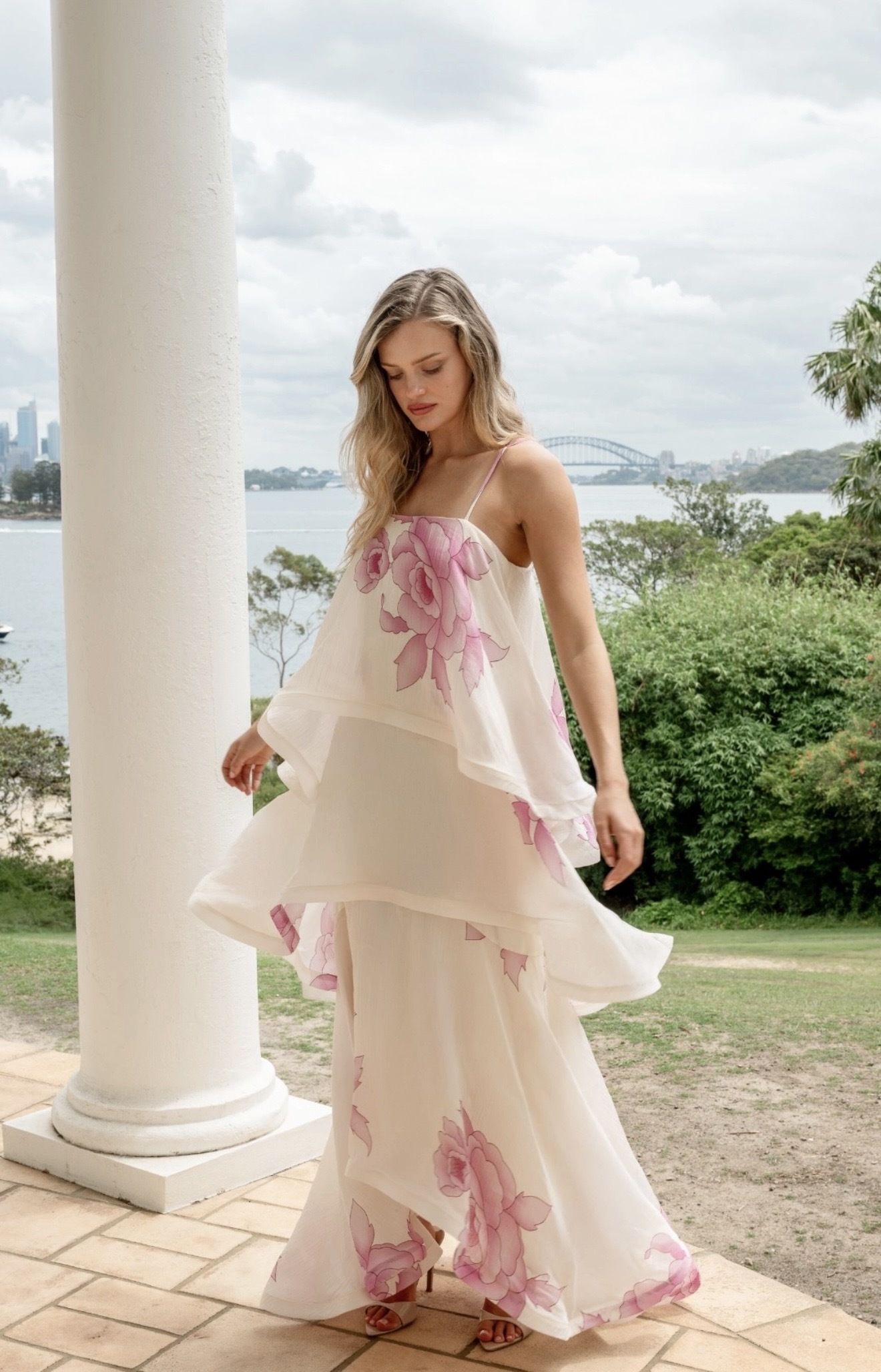 Borrow a Elliatt Rova Tiered Gown In Cream & Pink Floral